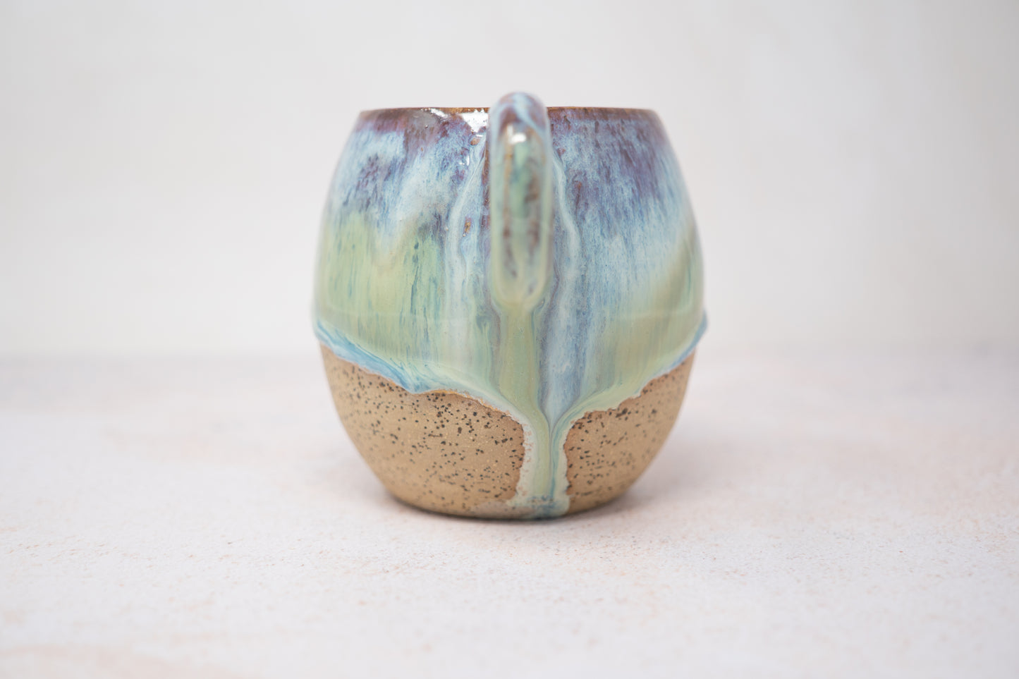 Purple, green and blue mug