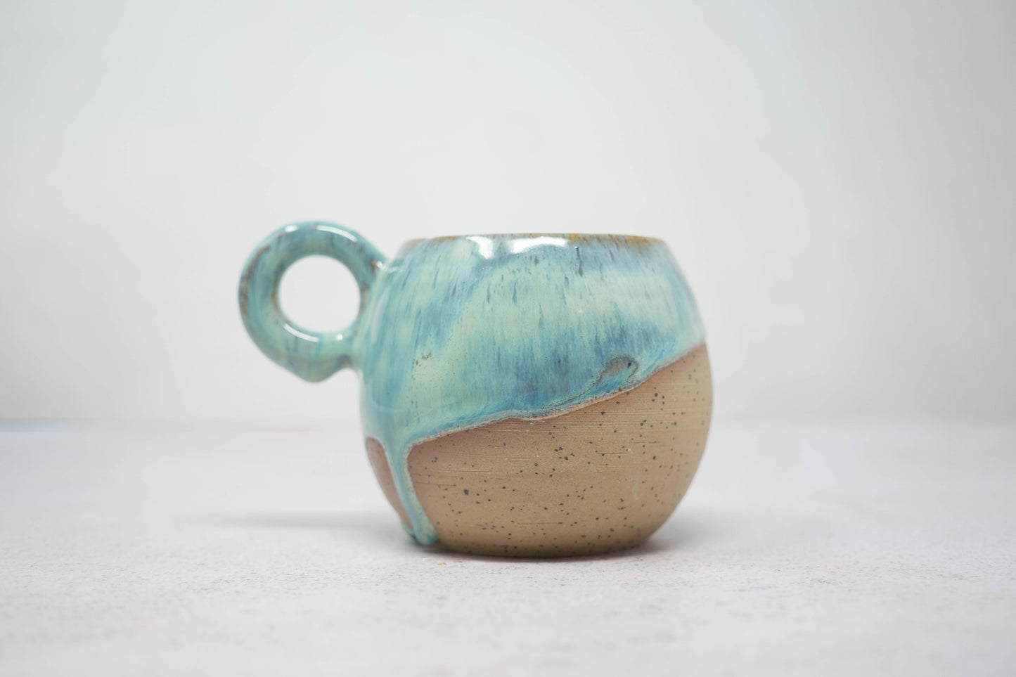 Turquoise green mug - light speckle