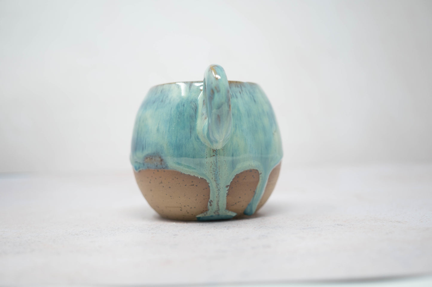 Turquoise green mug - light speckle