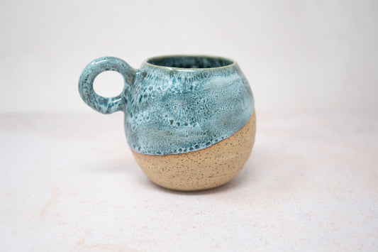 Green spotty mug